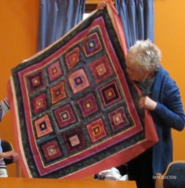 Quilt with multiple squares within squares