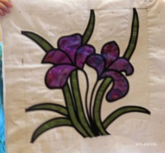 Work in progress: stained glass flower panel by Marge. Take a look at that hand quilting!
