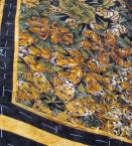 Detail of Jenny's latest kaleidoscope quilt, using a print featuring big cats!