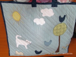 Applique quilted bag with kitty and other animals
